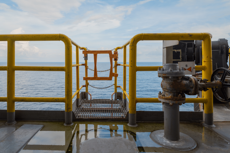 An ocean view from a boat, showcasing OSHA-compliant safety gates for passenger safety.