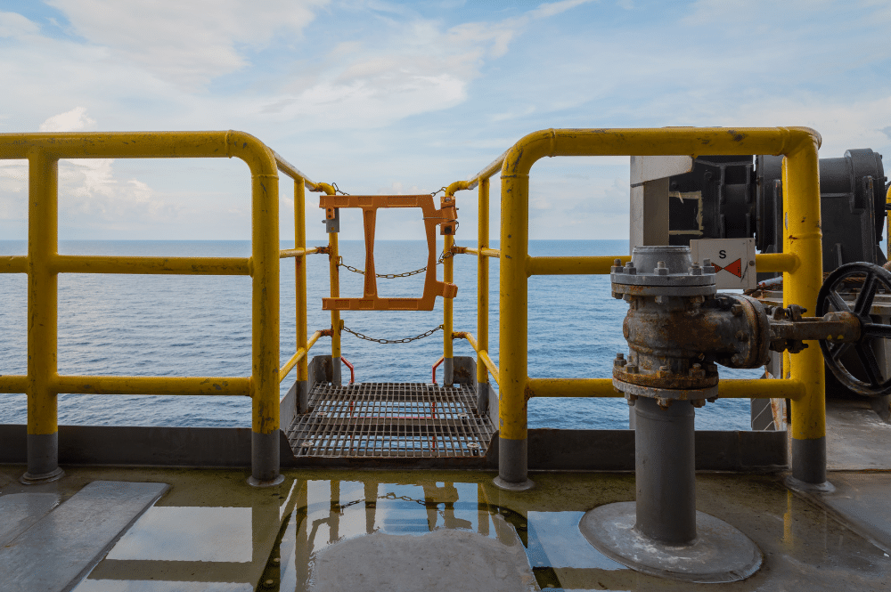 An ocean view from a boat, showcasing OSHA-compliant safety gates for passenger safety.